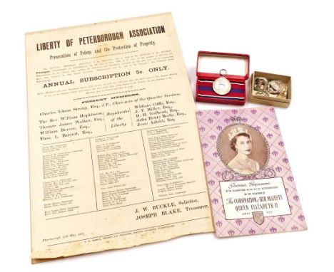 An Elizabeth II Coronation medal 1953, together with a souvenir program of the celebrations in the city of Peterborough on th