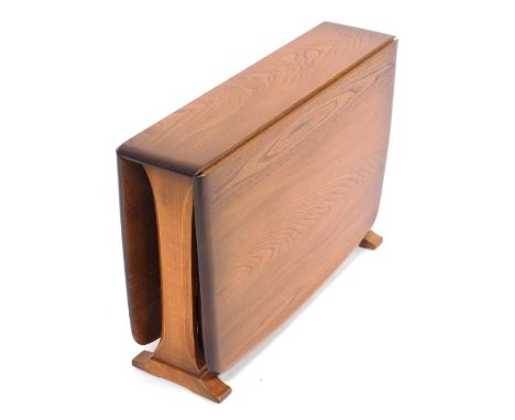An Ercol light elm drop leaf gateleg occasional table, 46cm high, 69cm wide, 17cm deep, 102cm extended.