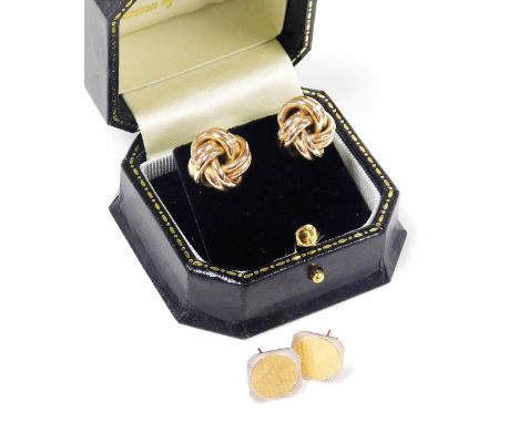 A pair of rose coloured knot earrings, yellow metal, 4.5g, together with a pair of bicolour earrings with engine turned decor