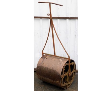 A garden roller, and an Aviary fifty-six pound weight. (2)