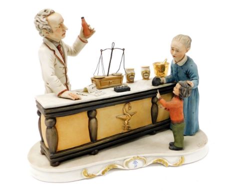 A Capodimonte porcelain figure group, of a chemist at his counter, with a customer and child, designed by R.Guidolin, no. 165