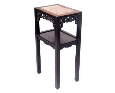 A late 19thC Chinese hardware jardiniere stand, of rectangular section with an inset marble top, carved scroll frieze with an