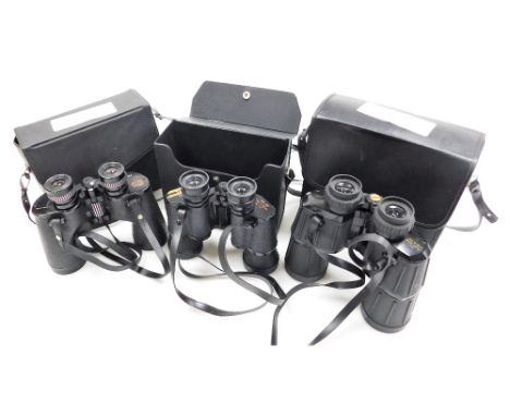 A pair of Swift Saratoga 8x40 binoculars, model no. 801, pair of Swift Tecnar 8x40 binoculars, no. 7323, and a pair of Wilkin