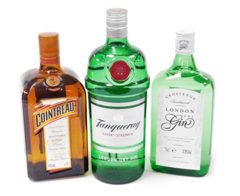 A bottle of Tanqueray export strength London dry gin, 1l, together with a 70cl bottle of Grosvenor London dry gin, and a bott