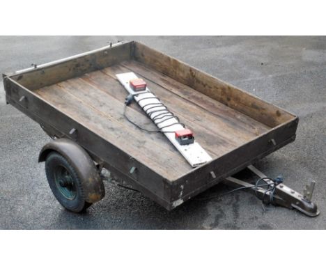 A car trailer, 115cm wide, with light board.