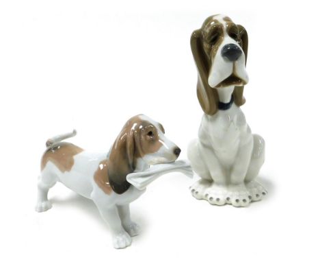 A Lladro Porcelain figure of a Basset Hound, modelled standing with a newspaper in its mouth, together with a Nao Porcelain f