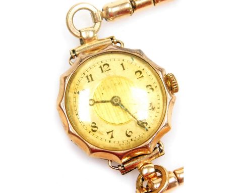 A 1920/30's Rolex 9ct gold cased wristwatch, circular yellow dial with engine turned decoration, silver chapter ring bearing 