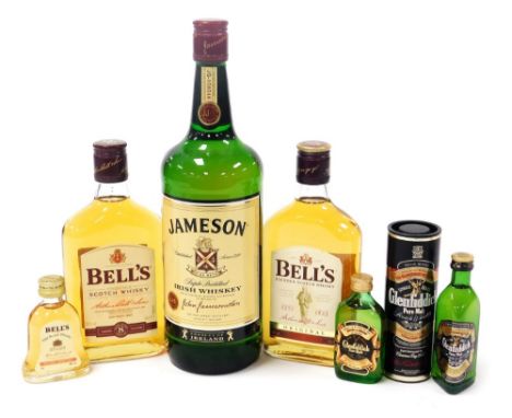 Two 35cl bottles of Bell's Scotch whisky, original and aged eight years, two miniature bottles of Glenfiddich whisky, and ano