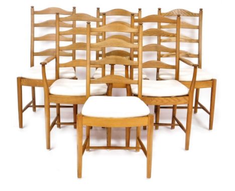 A set of six Ercol elm ladder back dining chairs, with slatted and loose cushion seats, raised on turned legs united by a H f