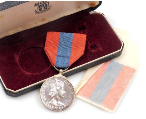 An Elizabeth II Imperial Service medal, cased.