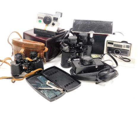 A Polaroid land camera, Agfa X-126 Auto Star camera, Schinon 35f-ee camera, pair of Denhil binoculars, Falcon Zoom binoculars