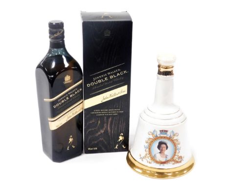 A bottle of Johnny Walker double black blended Scotch whisky, boxed, together with a Bells Scotch whisky decanter, of bell fo