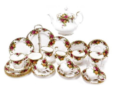 A Royal Albert Old Country Rose porcelain part tea service, comprising a teapot, two graduated cream jugs, sugar bowl, cake s