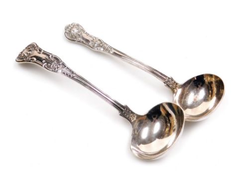 A Victorian silver King's pattern cream ladle, maker's mark indistinct, London 1865, together with a George V silver King's p