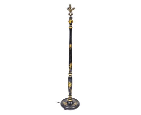 An early 20thC Japanned black lacquer standard lamp, the fitting for four bulbs, above a switch, the column decorated with Or