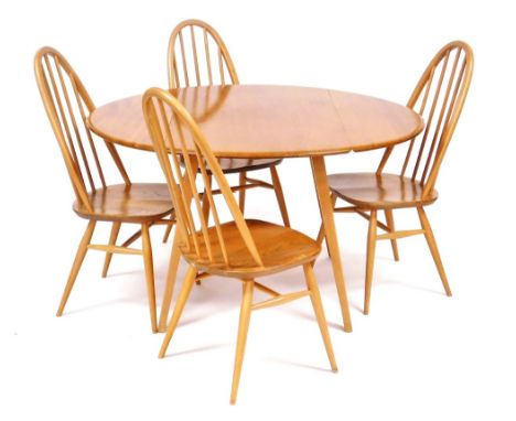 An Ercol light elm drop leaf dining table, raised on outswept square legs, 71cm high, 63cm wide, 121cm extended, 114cm deep, 