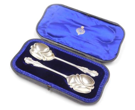 A pair of Edward VII Art Nouveau silver fruit spoons, Josiah Williams and Company, London 1903, 2.86oz.