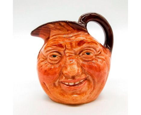 Style One, handle inside jug. Brown rim with light brown body.Royal Doulton backstamp. Artist: Charles NokeDimensions: 2.5"HM