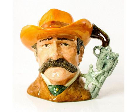 Brown coat; light brown hat with red band.Series: The Wild West Collection. Royal Doulton backstamp. Artist: Stanley J. Taylo