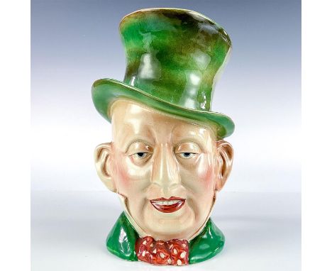 Glossy finish. Depicted in green hat and title deeds handle. Beswick backstamp.This item has no reserve. Dimensions: 9"HManuf