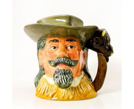Light brown hat and buckskin jacket.Series: The Wild West Collection. Royal Doulton backstamp. Artist: Robert TabbenorIssued: