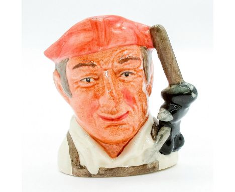 Character jug from Williamsburg in salmon hat, white shirt and brown apron with hammer, anvil and pliers as handle.Royal Doul