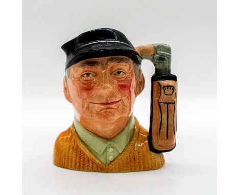 Variation One. Blue cap; brown sweater; tan shirt; light brown golf bag.This Golfer character jug was modeled in the likeness