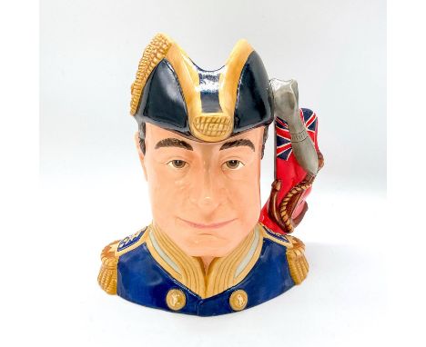 Navy, black, gold, red, and grey. Issued 2007 in a limited edition of 100. Designed by Caroline Dadd and modeled by Robert Ta