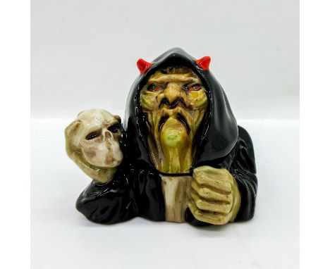 Glazed lidded pot depicting a warlock with a grumpy expression holding a skull.Kevin Francis backstamp. Certificate of Authen