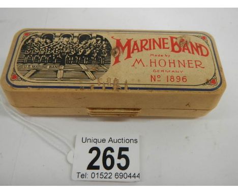 A boxed Hohner Special 20 marine band harmonica