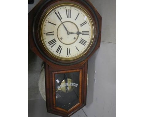A Victorian drop dial regulator wall clock.