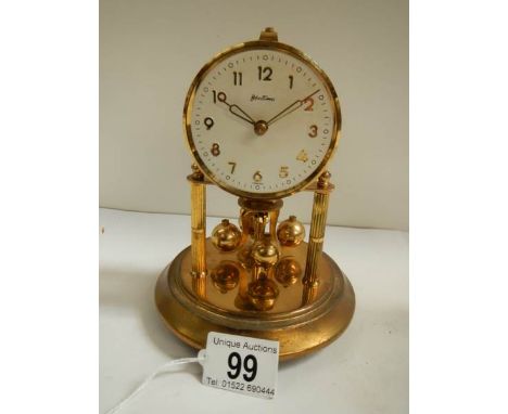 A small anniversary clock, in working order.