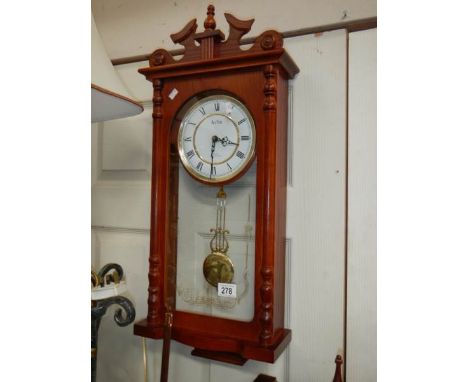 A modern wall clock in working order.