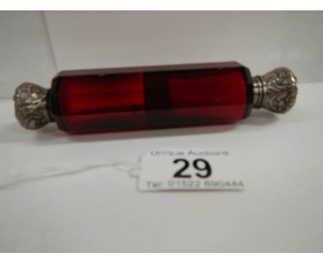 A Victorian ruby glass double ended scent bottle, 5" long, in good condition.