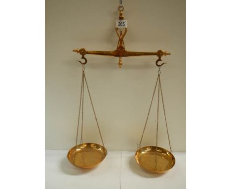 A set of solid brass balance scales