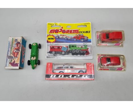 Majorette:&nbsp;two vintage vehicles in original bubbles; together with another train and carriage, in original blister pack;