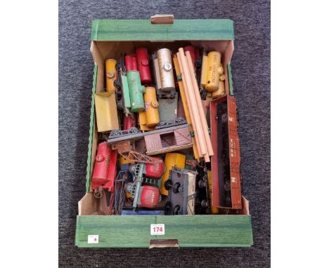 Hornby 0 Gauge:&nbsp;a quantity of vintage oil tankers, cranes, and other commercial wagons, to include a United Dairies Milk