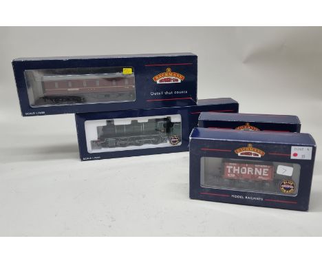 Bachmann:&nbsp;a Southern locomotive No.1406; together with an LMS parcel van and two freight wagons, all boxed. (4) 