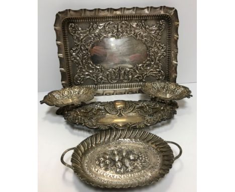 A pair of pierced silver bonbon dishes with scrolling foliate decoration raised on pedestal bases (Sheffield 1867 by Harrison