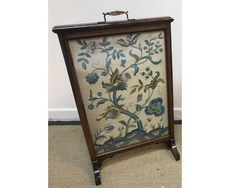 A circa 1900 rosewood framed fire screen with silk needlework panel of stag and blossoming tree, 55.5 cm wide x 94 cm high