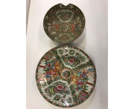 A pair of late 19th Century Chinese famille rose porcelain vases with flared rims, the main bodies decorated with panels of a