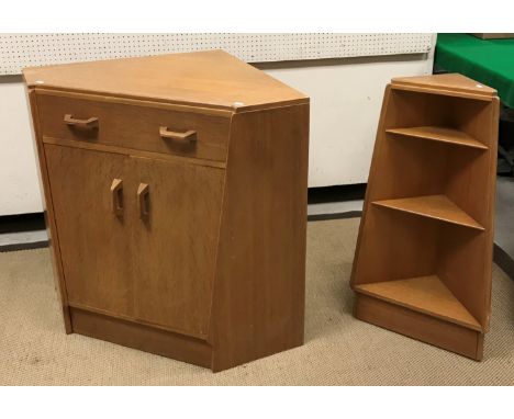 A collection of G Plan oak furniture to include a corner secretaire unit with fall front drawer over two cupboard doors, 98.5