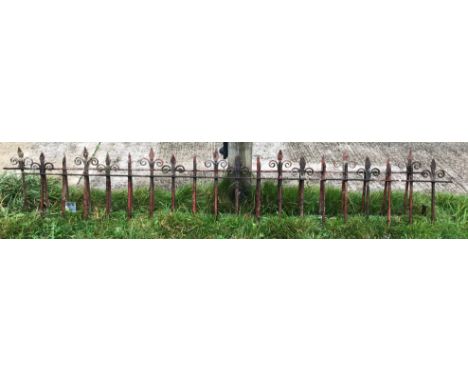 Two vintage cast metal wrought iron railing sections, each approx 260 cm long
