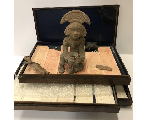 A 19th Century rosewood three tiered lidded box containing various plaster cast relief panels depicting classical scenes toge