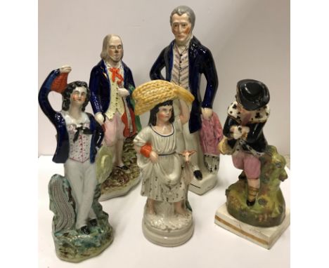 A collection of five various Staffordshire figures including Duke of Wellington 35 cm high, man with viola and spaniel 29.5 c