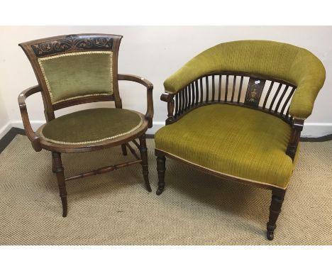 An Edwardian mahogany and inlaid salon elbow chair on turned legs united by turned stretchers, together with another salon tu