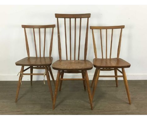 ERCOL, SIX WINDSOR ELM AND BEECH DINING CHAIRS, CIRCA 1960-69 comprising a set of five model 391 low back, and one model 608 