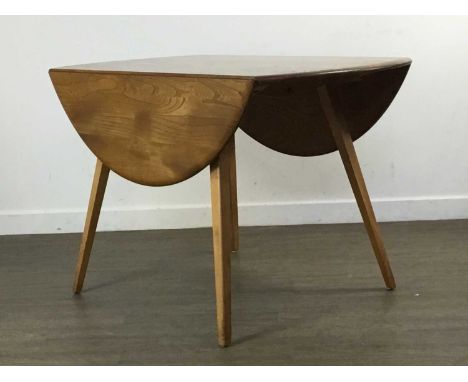 ERCOL, WINDSOR MODEL 384 DROP LEAF DINING TABLE AND FIVE MODEL 449 DINING CHAIRS, CIRCA 1960-69 all in elm and beech, the tab