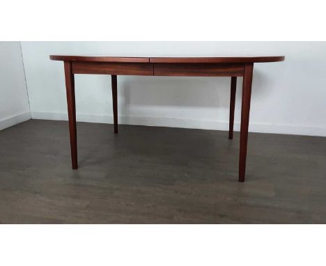 ROSEWOOD DINING SUITE, 1960-69  comprising an extending dining table with two additional leaves, and eight ladder back chairs