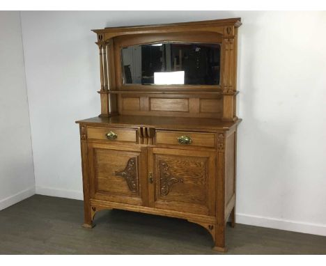 ARTS & CRAFTS OAK MIRROR BACKED SIDEBOARD, mirror back, the base with two short drawers over twin cupboard doors85cm high, 13